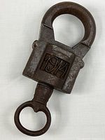 Full view of cast-iron shackle gate lock