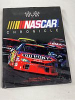 Front cover of NASCAR Chronicle book with dust jacket