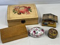 Group of five items: large floral box, Myrtlewood box, porcelain trinket dish, Yardley box, chalet music box