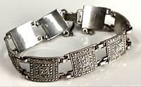 Full view of sterling silver bracelet showing panel links