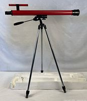 Entire telescope assembled on tripod with styrofoam insert below