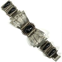 Full view of bracelet showing all panels and clasp