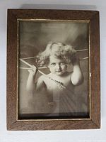 Front view of framed Cupid Awake print