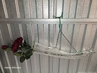 Horn-shaped crystal wall vase hanging, artificial roses inserted