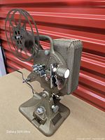 Projector front view with reel mounted