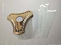 brass plate and bundled crystal rods side by side