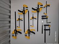 Frontal view of all nine clamps mounted vertically for full inventory check