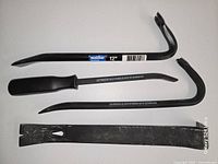 All four pry bars laid out for identification