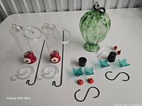 Full set of three feeders with accessories laid out