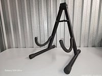 Full view of black A-frame stand set up