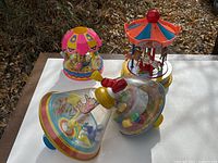 Group shot of four carousel toys