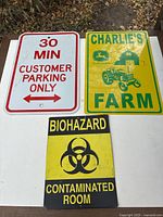 Group shot of all three metal signs