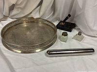 Group shot showing tray, both glass shakers, cigar tube, marble pen stand