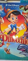 Full view Disney Pinocchio poster artwork showing central character and title
