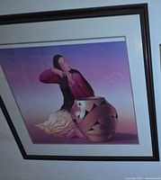 Full framed artwork showing complete image and frame