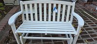 Front view of white wooden glider bench