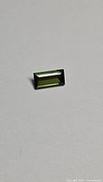 Front view of rectangular green tourmaline