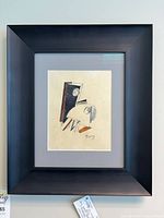 Front view of first framed abstract artwork