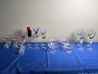 All stemware groups displayed on blue cloth