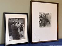 Two framed black-and-white photographs side by side