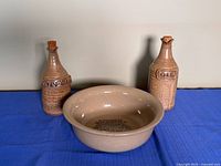 Front view of bowl and two cruets
