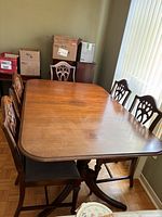Full view of dining table with 6 chairs in room