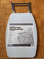 Entire folding table front with label visible