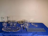 Group shot of all glass items on blue cloth