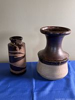 Front view of both vases showing overall shapes and glazes