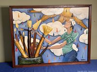 Front view of framed mixed media artwork