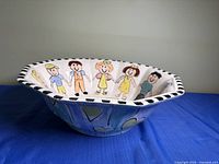 Side view of bowl showing exterior heart motif