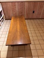 Top view of rectangular wood coffee table surface