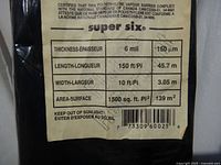 Close-up of English spec label listing thickness, length, width, area