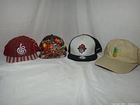 Front view of all four hats arranged side by side