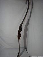 Full length view of the recurve bow showing overall shape and string