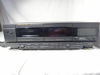 Front view of Fisher CR-W9145 cassette deck showing both tape wells and control panel