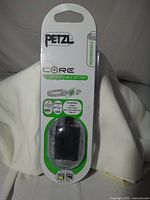 Front of Petzl CORE rechargeable battery blister pack