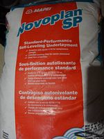 Front view of MAPEI Novoplan SP bag with branding and weight information visible