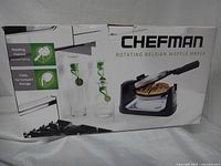 Retail box showing Chefman Rotating Belgian Waffle Maker branding