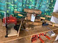 overall lot with miter box, clamps, mallet, corner clamps visible