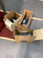 Three boxed Emerson motors
