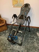 Front three-quarter view of Teeter inversion table fully assembled