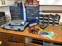 overview of workbench with organizers, hex key set, hand tools, hardware