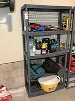 Full view of grey five-shelf resin unit