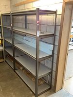 Both metal shelving racks full view