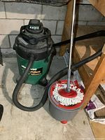 Shop-Vac vacuum and spin mop set together on floor