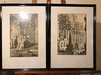 Both framed prints side by side.