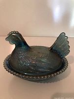 Side view of assembled rooster candy dish