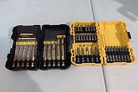 Both DeWalt bit sets open side by side