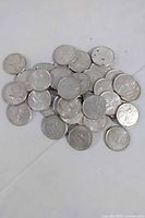 Pile of 1968 Canadian silver quarters